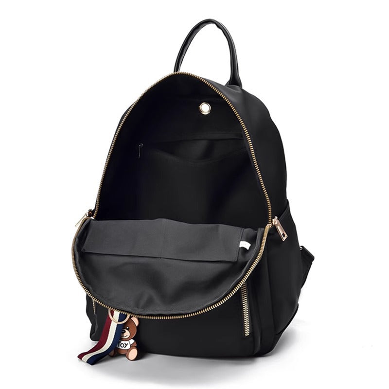 Fashionable Oxford Fabric Backpack for Women with Bear Charm, Waterproof and Durable Design for Daily Use and Travel
