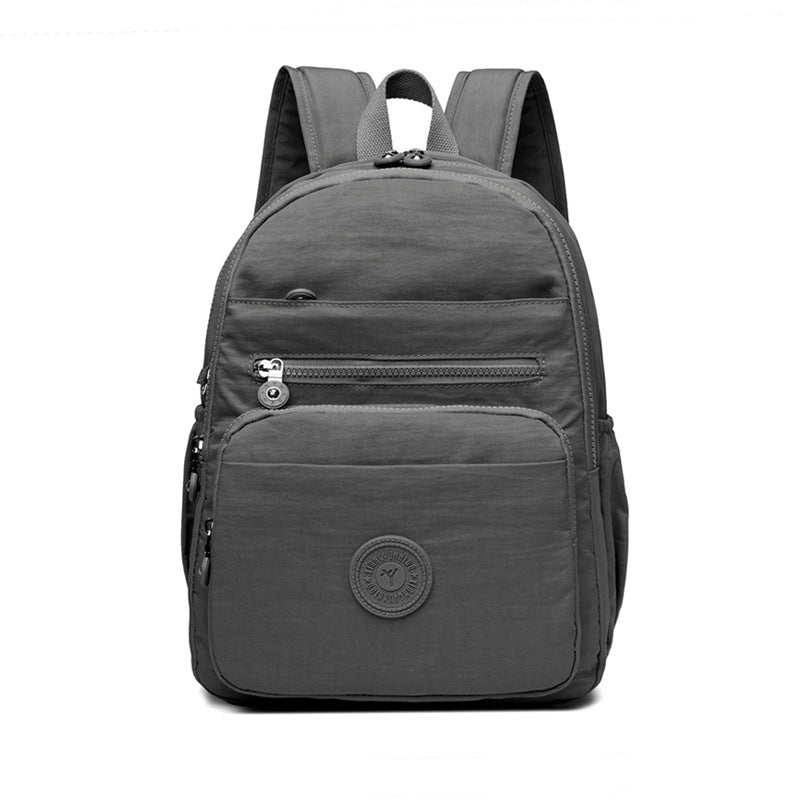 Lightweight Breathable Nylon Backpack for Travel and School, Fashionable Street Style with Multiple Pockets and Zipper Closure