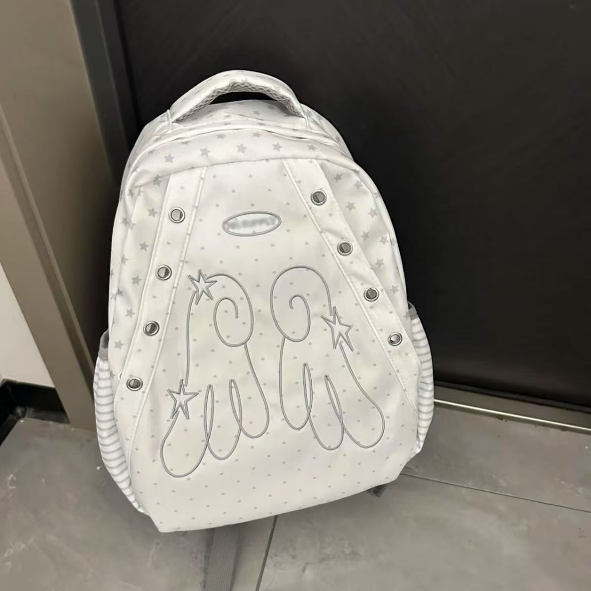 Cute Star Pattern Wings Backpack with Waterproof Design for Students and Daily Use