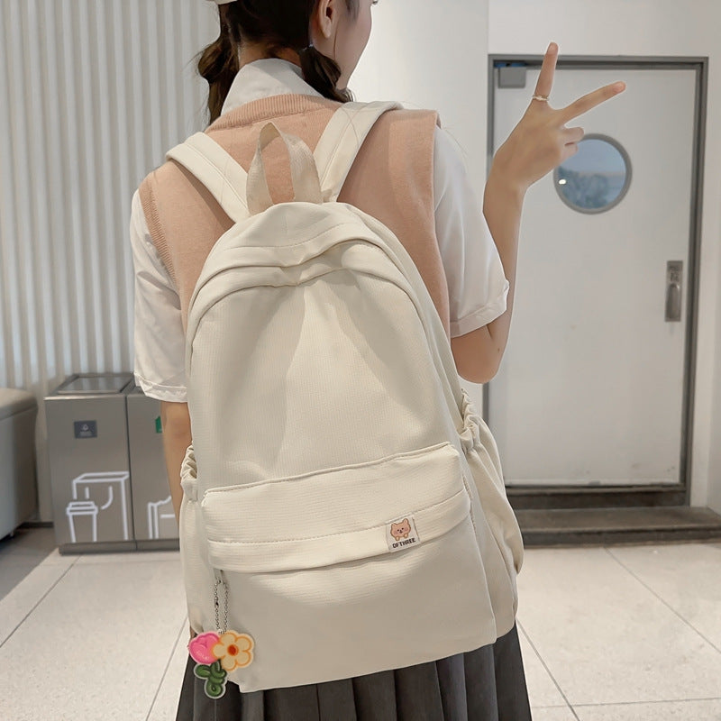 Lightweight Simple Backpack for Students with Large Capacity, Perfect for School, Travel, and Laptops up to 14 Inches