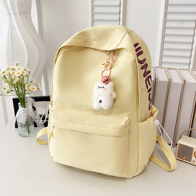 Stylish High-Capacity Backpack for Teen Girls, Japanese Casual Design with Cute Plush Charm and Durable Nylon Material