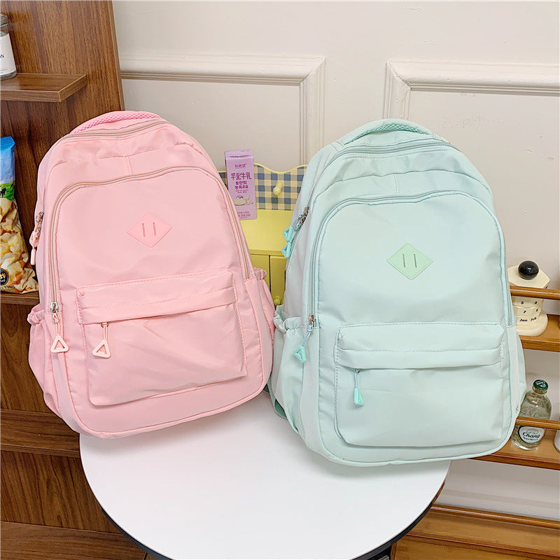 New Simple Color Backpack with Large Capacity, Lightweight and Stylish for Students and Travel
