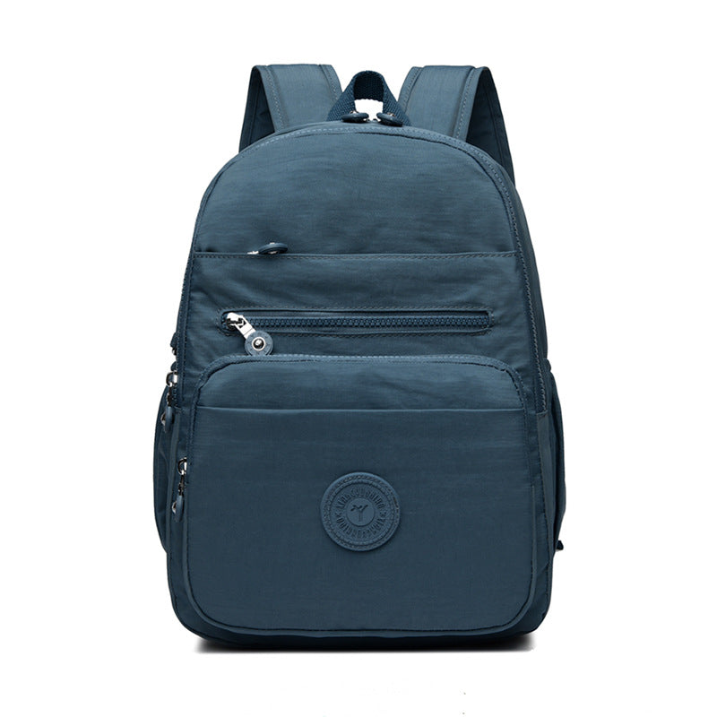 Lightweight Breathable Nylon Backpack for Travel and School, Fashionable Street Style with Multiple Pockets and Zipper Closure