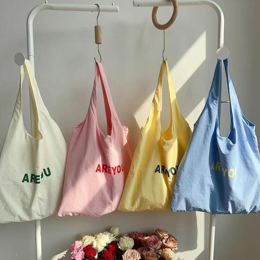 Minimalist Canvas Tote Bag with Letter Print, Large Capacity Shoulder Bag for Daily Use, Fashionable and Versatile Design