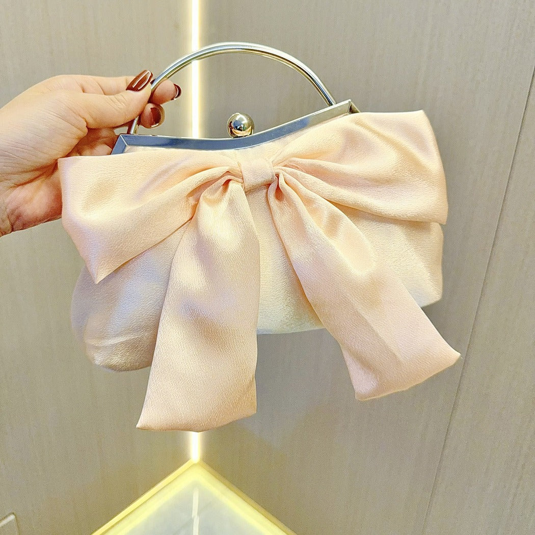 Elegant White Bow Handbag with Metal Handle for Wedding and Evening Events, Soft Satin Design with Inner Pockets