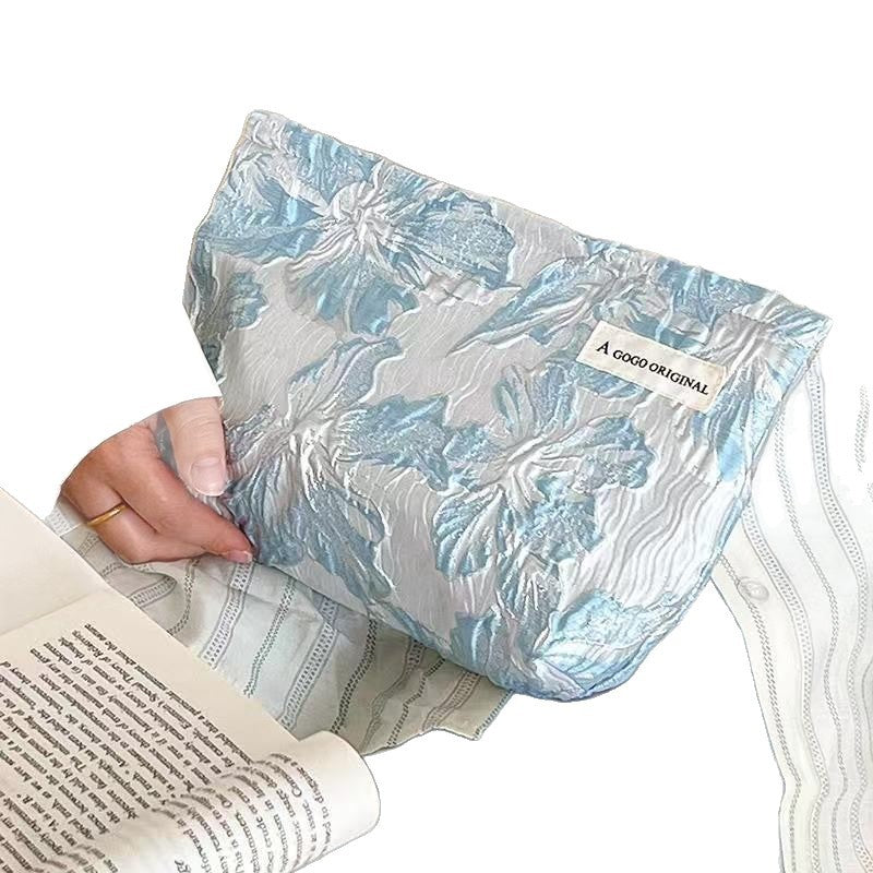 High Sense Women's Cosmetic Bag Large Capacity Portable Liner Buggy Bag Exquisite Embossed Design