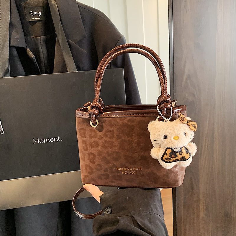 Chic Vintage Bucket Bag with Plush Charm for Women, Perfect for Daily Wear and Fashionable Outfits