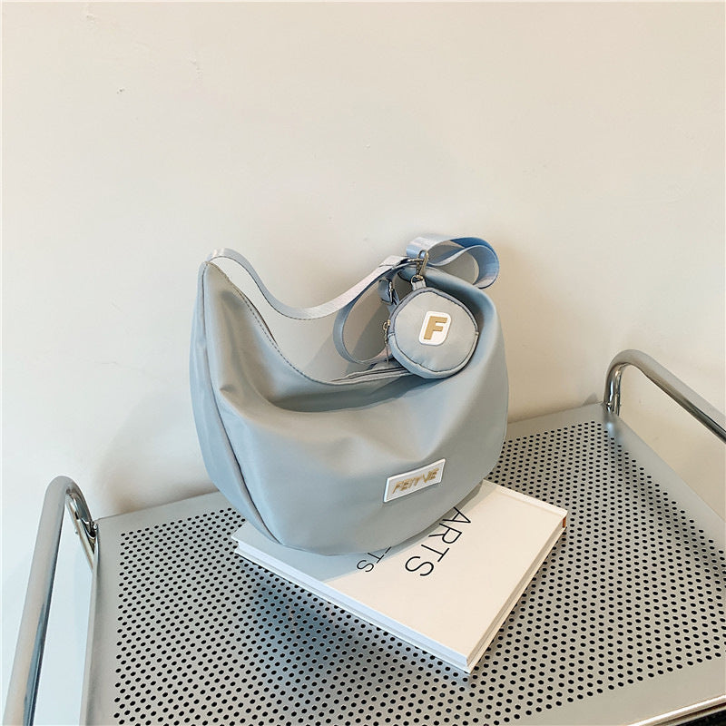 Casual Nylon Moon Bag with Letter Logo, Soft Crossbody Sling for Daily Commute and School
