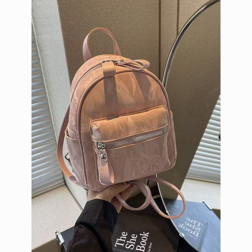 Minimalist PU Backpack for Women - Stylish Daily Commute and Travel Bag with Zippered Pockets and Soft Design
