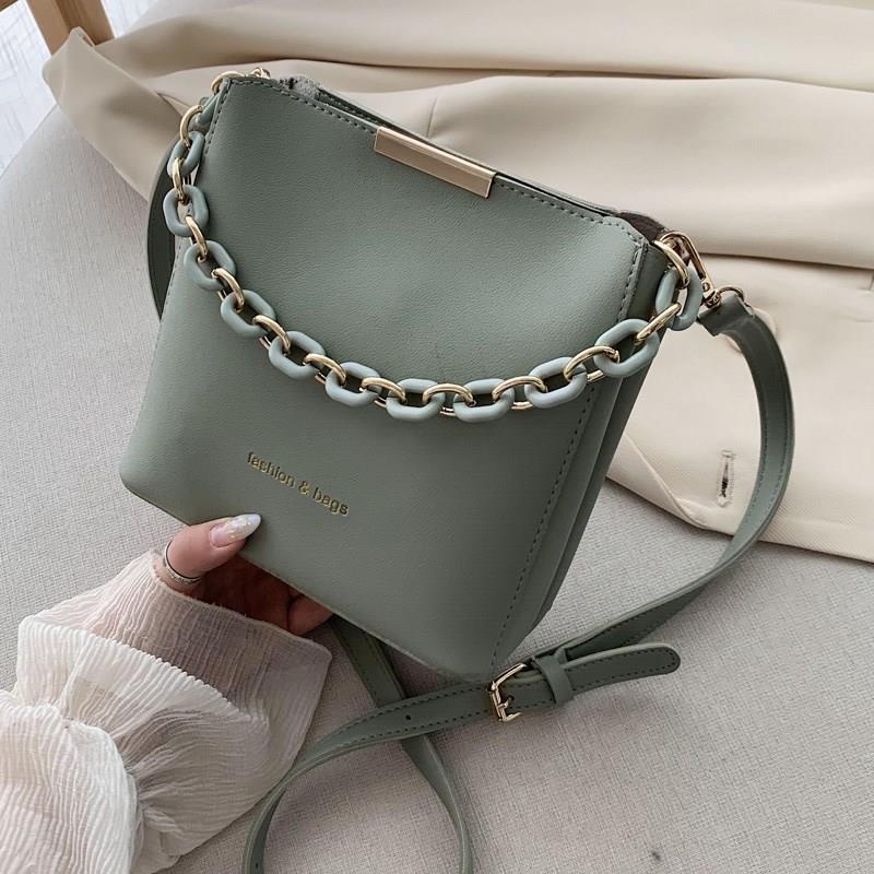 Chic Urban Mini Bucket Bag with Chain Strap and Zip Closure for Everyday Style