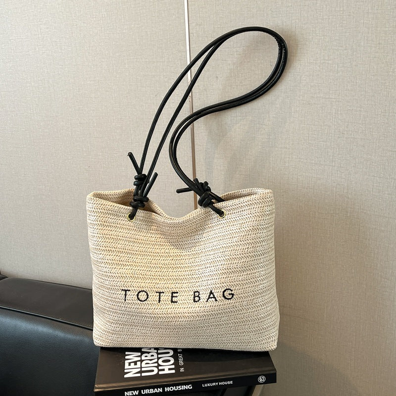 Stylish Straw Tote Bag with Leather Handles for Beach, Travel and Daily Use