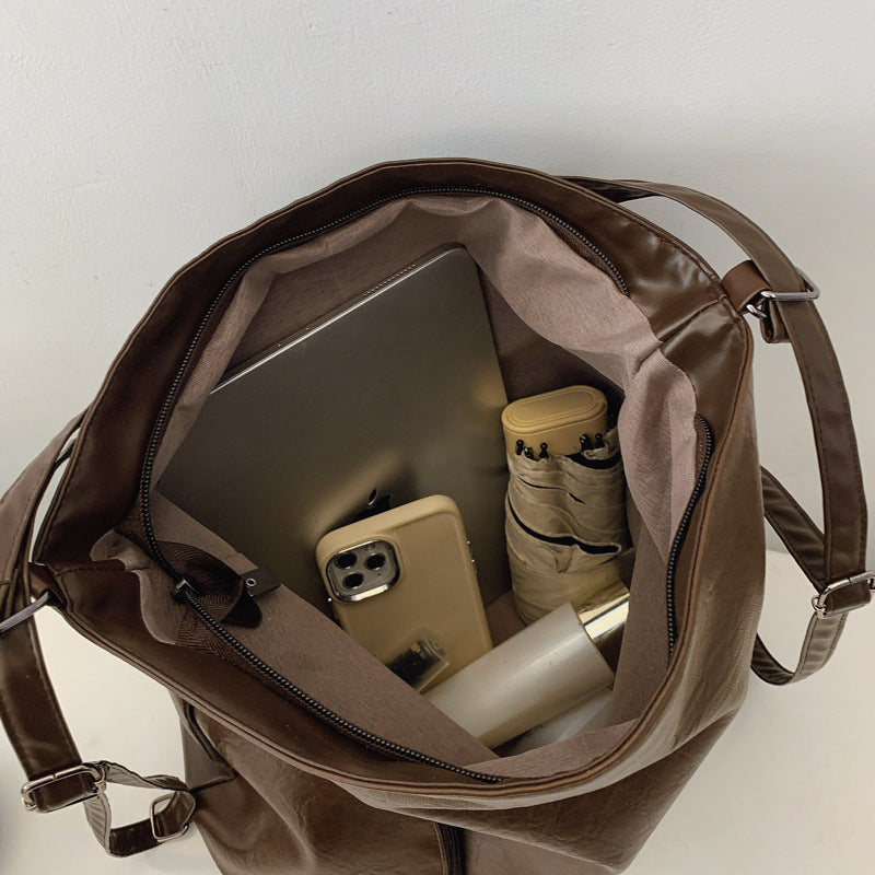 Vintage Fashion Large Capacity Soft PU Shoulder Bag with Zipper Closure and Stylish Stitching Details