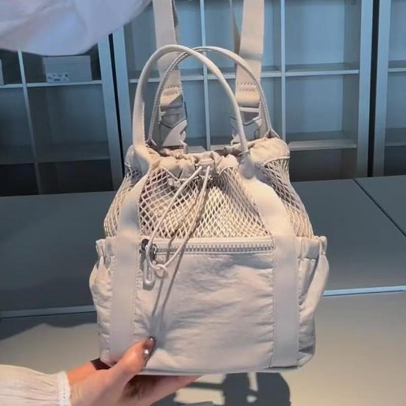 Chic Mesh Drawstring Tote Backpack for Women - Breathable Casual Style with Zippered Pocket and Adjustable Straps