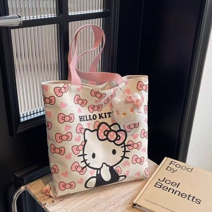 Hello Kitty Canvas Tote Bag with Cute Plush Charm, Large Capacity Shoulder Bag for Women, Perfect for Daily Use and Travel