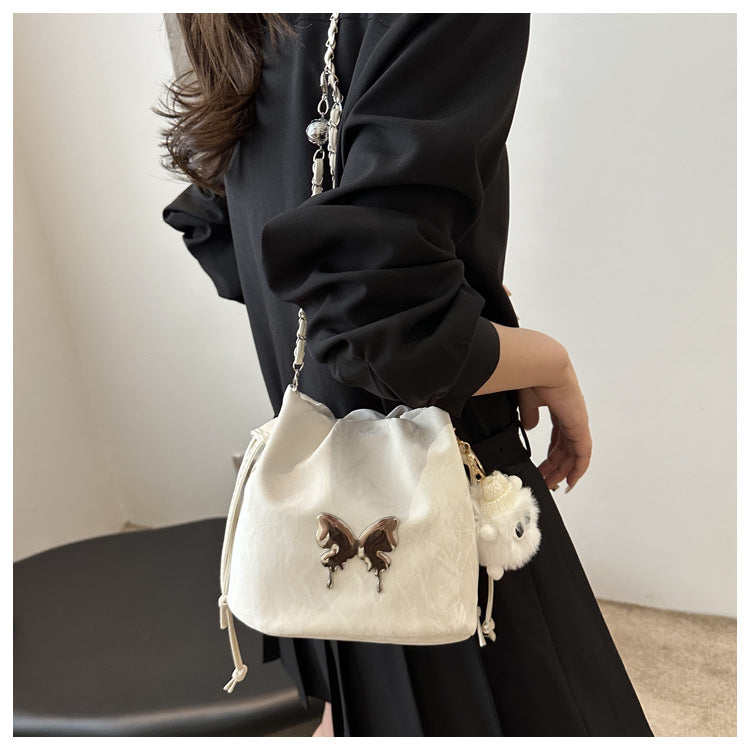 Fashionable Drawstring Bucket Bag with Chain Strap and Cute Pom-Pom Charm for Women