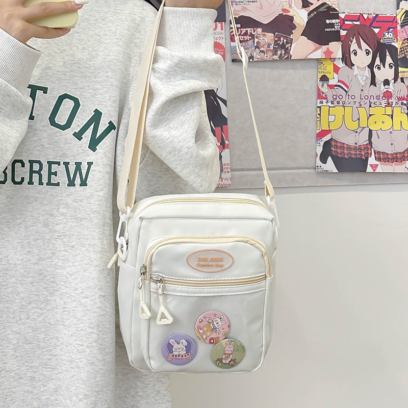 Cute Fashion Crossbody Bag with Multiple Pockets and Cartoon Badges for Daily Use