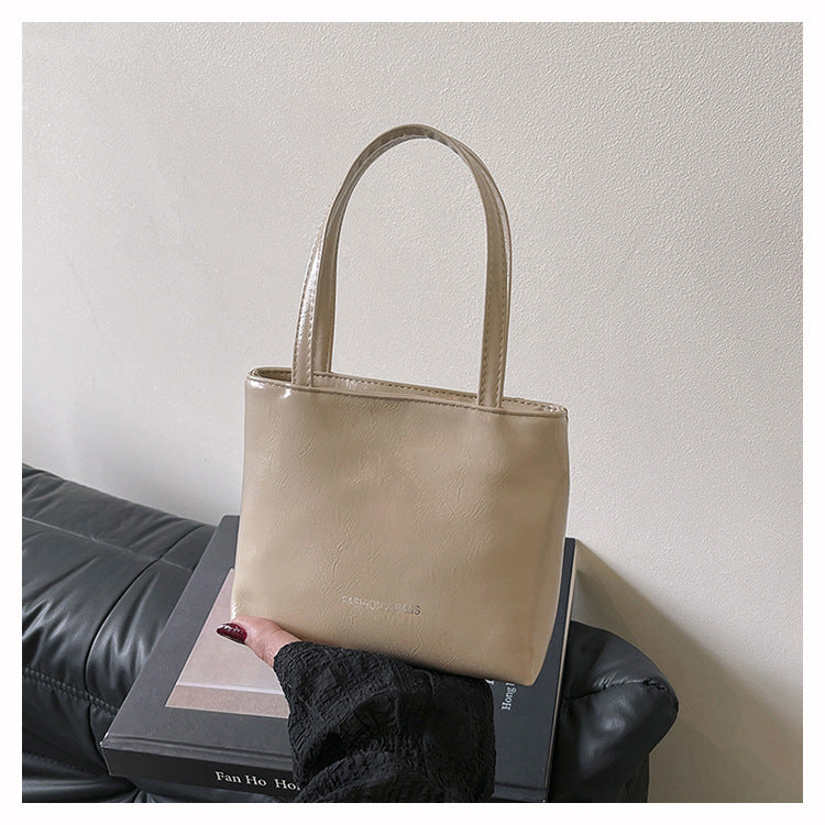Minimalist Elegant Tote Bag for Women 2025 New Fashion Simple Solid Color Handbag with Magnetic Closure and Stitching Details