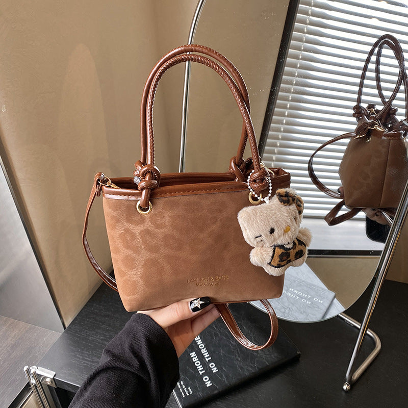 Chic Vintage Bucket Bag with Plush Charm for Women, Perfect for Daily Wear and Fashionable Outfits