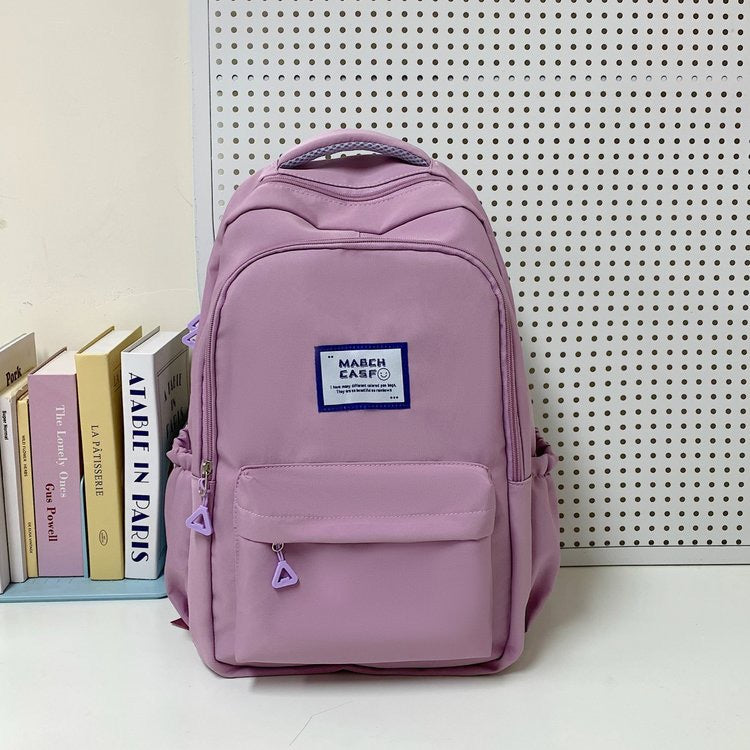 Minimalist High-Capacity Backpack for Students and Daily Use with Fashionable Letter Design