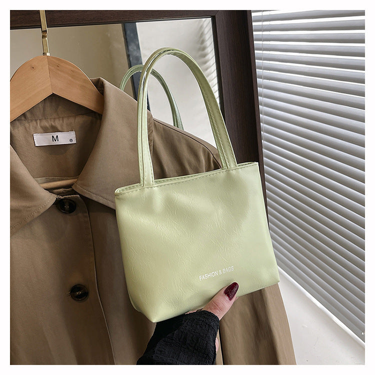 Minimalist Elegant Tote Bag for Women 2025 New Fashion Simple Solid Color Handbag with Magnetic Closure and Stitching Details