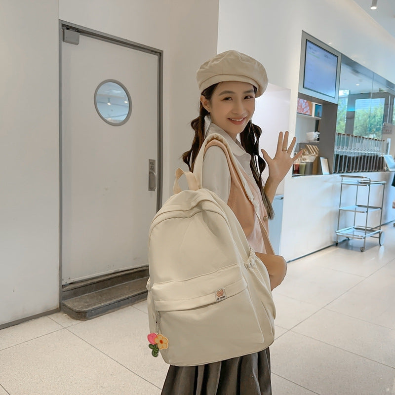 Lightweight Simple Backpack for Students with Large Capacity, Perfect for School, Travel, and Laptops up to 14 Inches