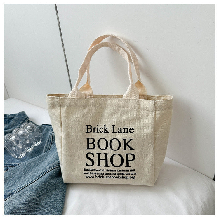Minimalist Canvas Tote Bag with Book Shop Print for Daily Use and Commuting