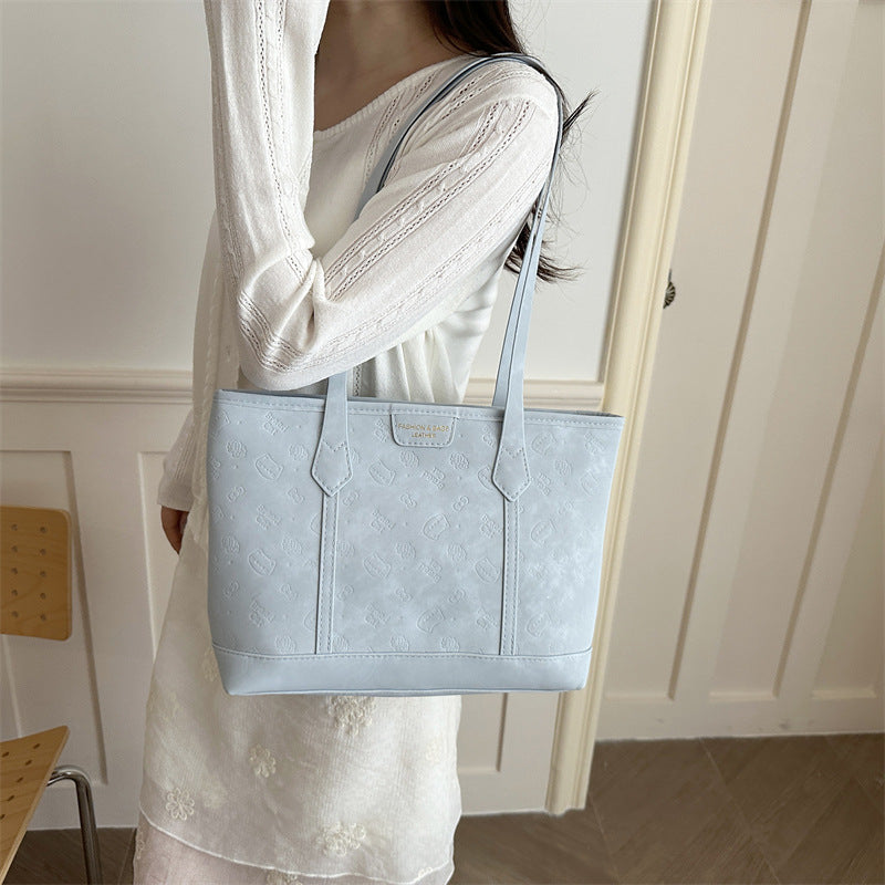 Chic Embossed Tote Bag for Women with Fashionable Monogram Pattern and Spacious Design Perfect for Daily Commute and Casual Outings