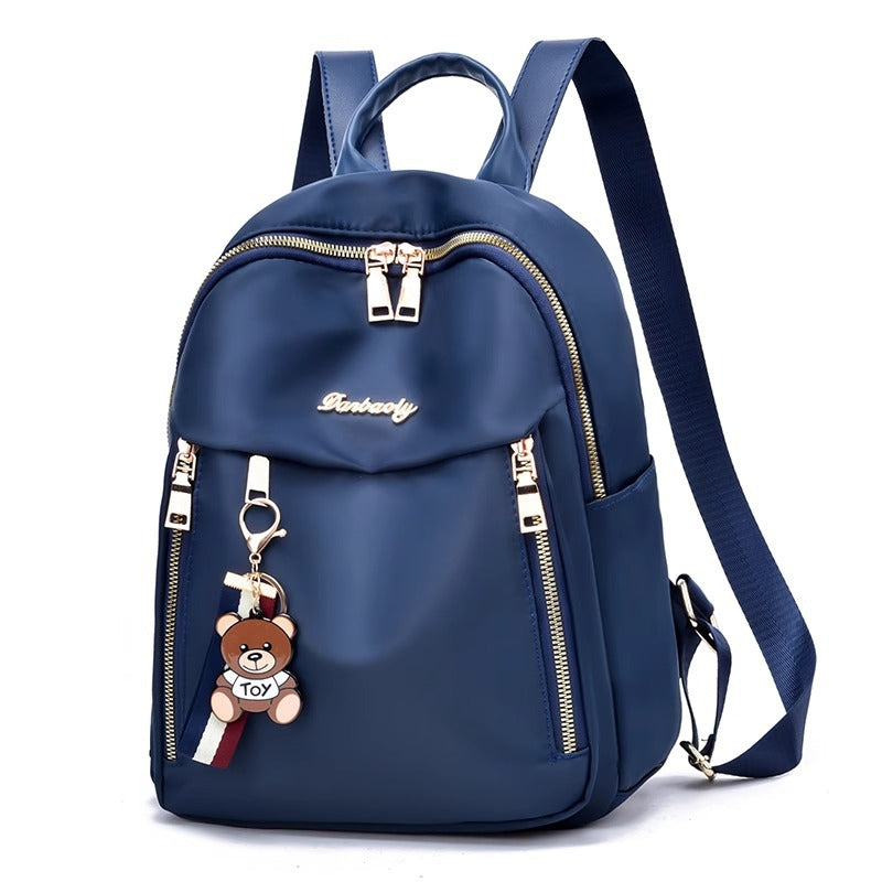 Fashionable Oxford Fabric Backpack for Women with Bear Charm, Waterproof and Durable Design for Daily Use and Travel