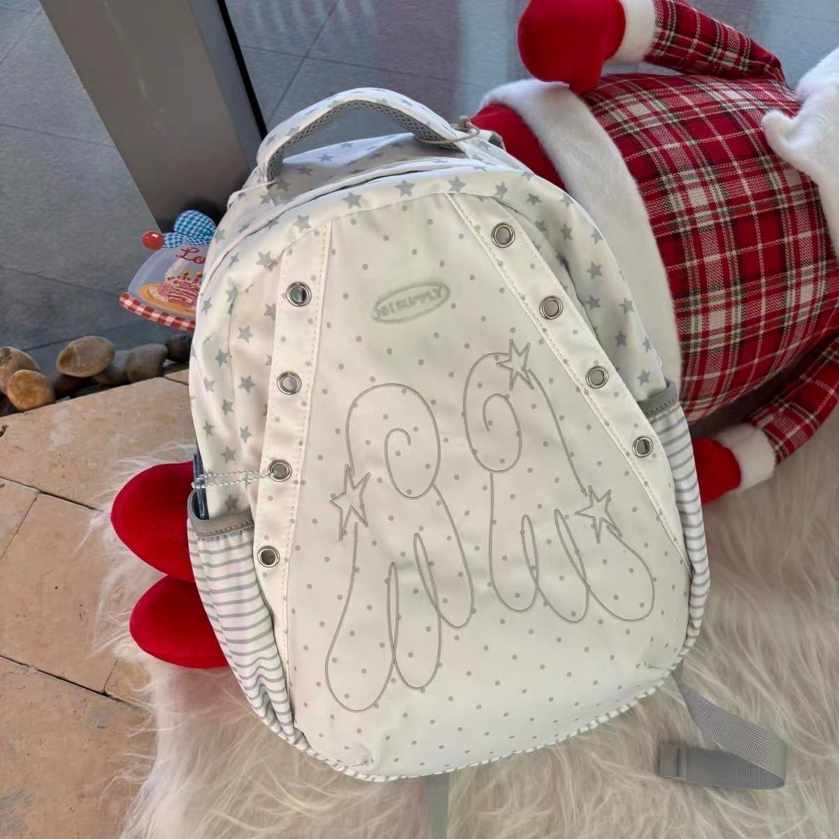 Cute Star Pattern Wings Backpack with Waterproof Design for Students and Daily Use