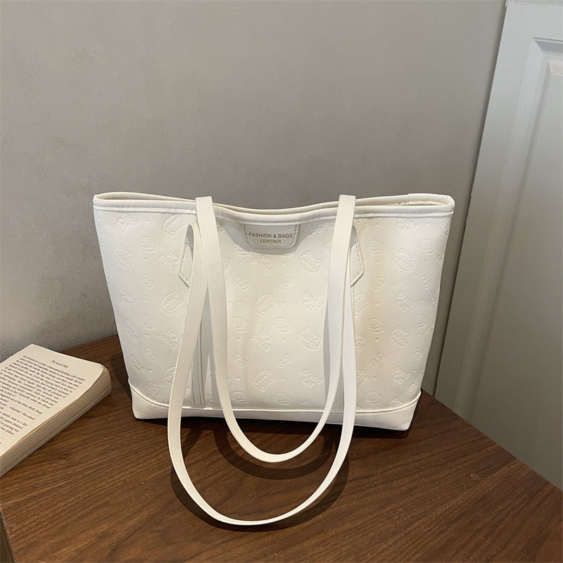 Chic Embossed Tote Bag for Women with Fashionable Monogram Pattern and Spacious Design Perfect for Daily Commute and Casual Outings