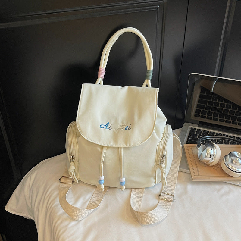 Chic Minimalist Backpack for Women with Embroidery Design, Lightweight Oxford Fabric, Perfect for Daily Use and School