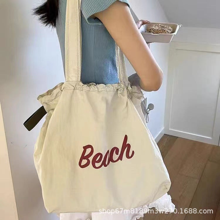 2025 Spring New Fashion Large Capacity Shoulder Tote Bag for Women, Simple Commute Student Style with Beach Print and Drawstring Design
