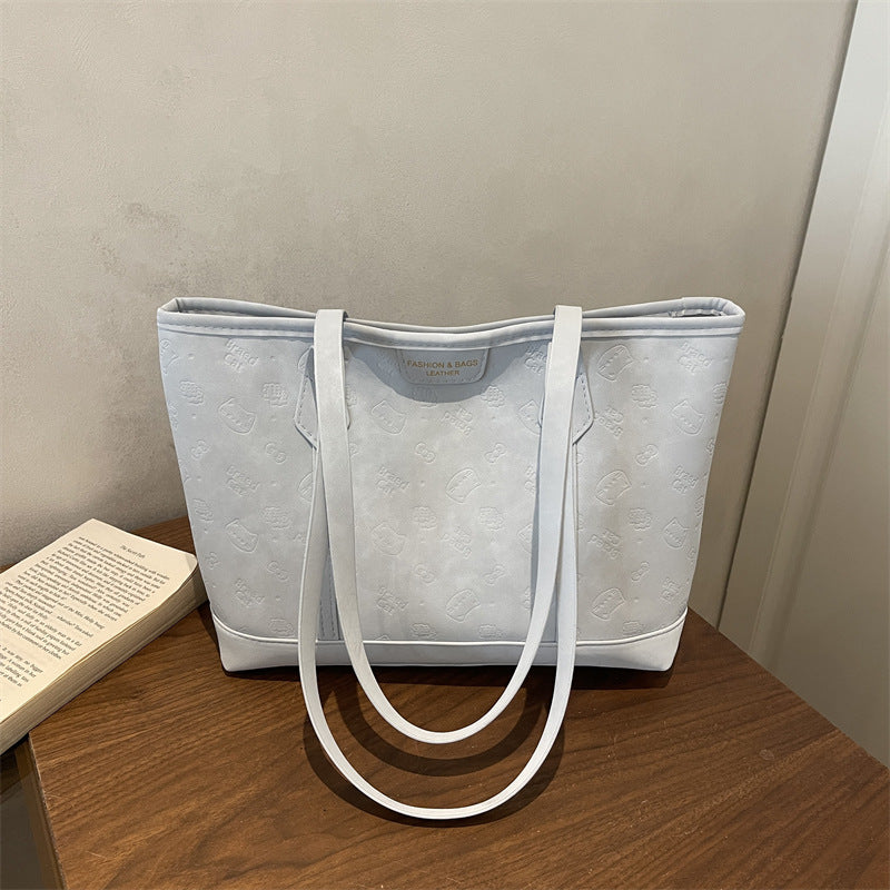 Chic Embossed Tote Bag for Women with Fashionable Monogram Pattern and Spacious Design Perfect for Daily Commute and Casual Outings