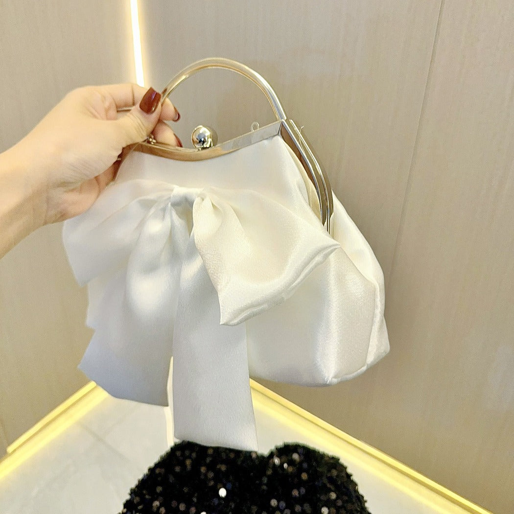 Elegant White Bow Handbag with Metal Handle for Wedding and Evening Events, Soft Satin Design with Inner Pockets
