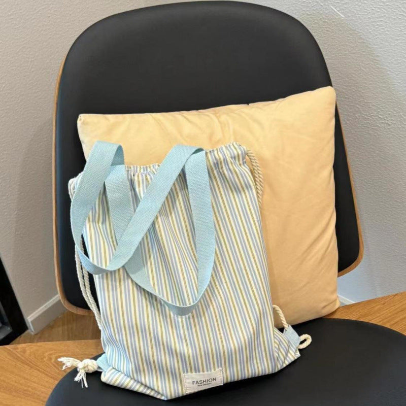 Canvas casual backpack for women, new drawstring striped large capacity shoulder bag