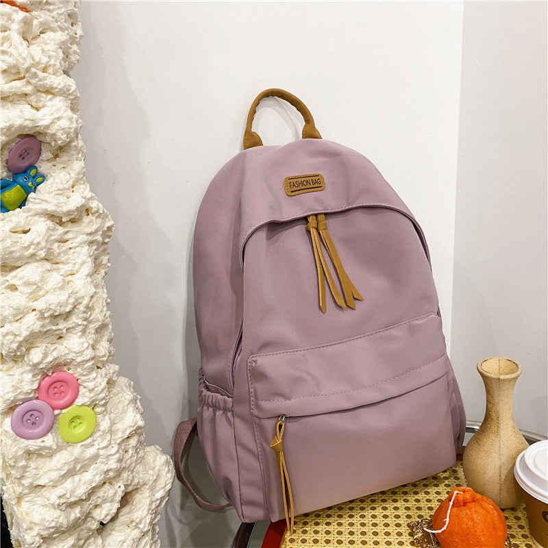 Simple Stylish Nylon Backpack for Students and Travel with Waterproof Design and Comfortable Ergonomic Back Panel
