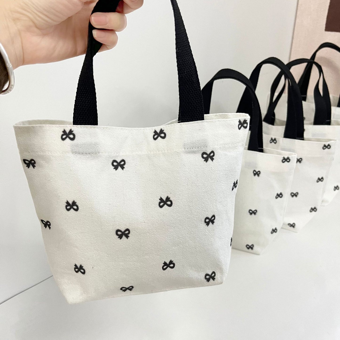 Cute Bow Print Canvas Tote Bag for Women, Fashionable Everyday Carry with Phone Pocket and Double Handles
