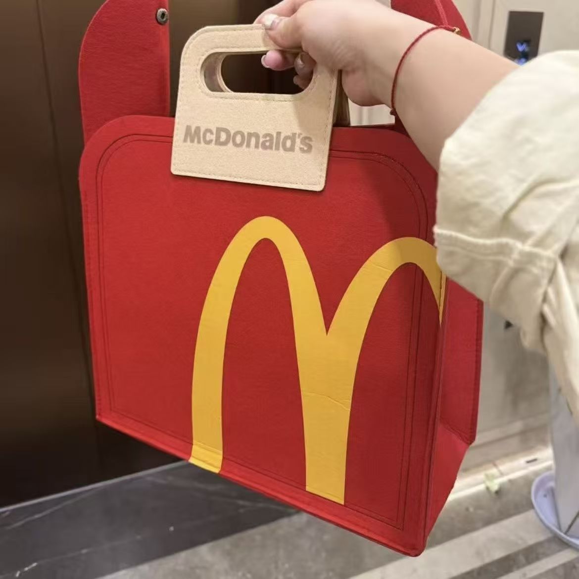 McDonald's Women's Limited Felt Portable Storage Bag Multi-Purpose Fashion Handbag Suitable for Daily Travel and Collection