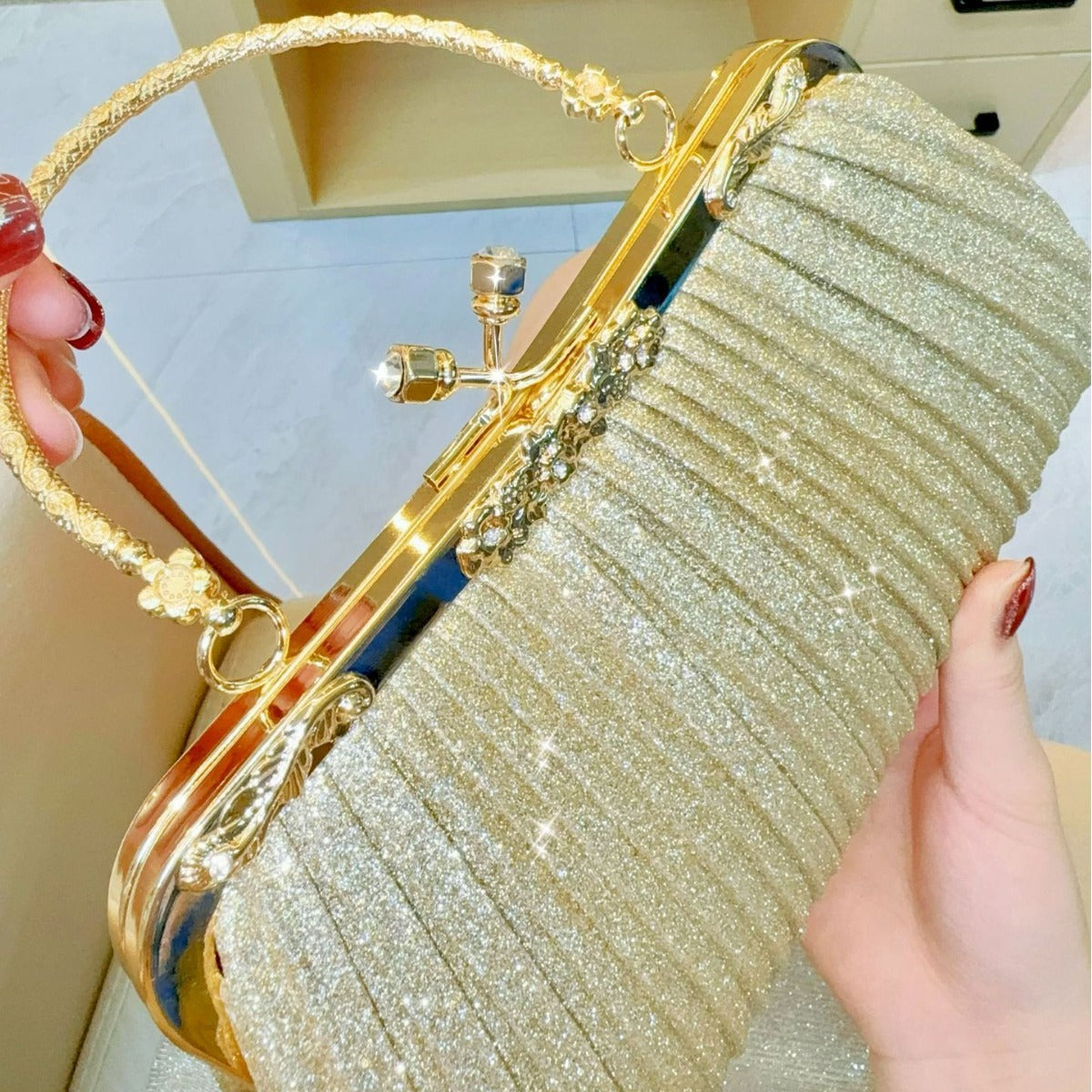 Elegant Pleated Clutch Bag with Rhinestone Closure and Gold Handle for Evening Events
