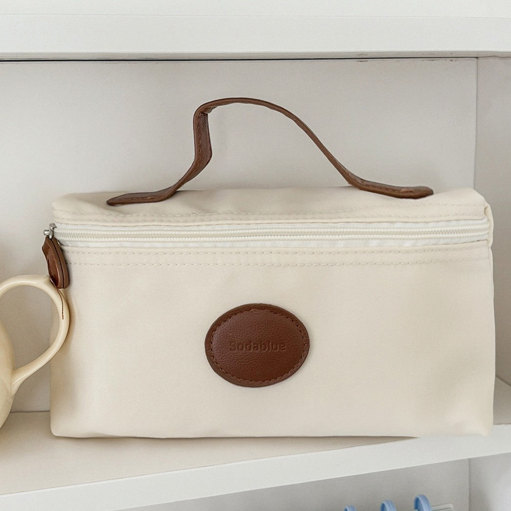 Elegant Nylon Cosmetic Bag with Leather Accent Handle, Lightweight & Portable for Daily Use