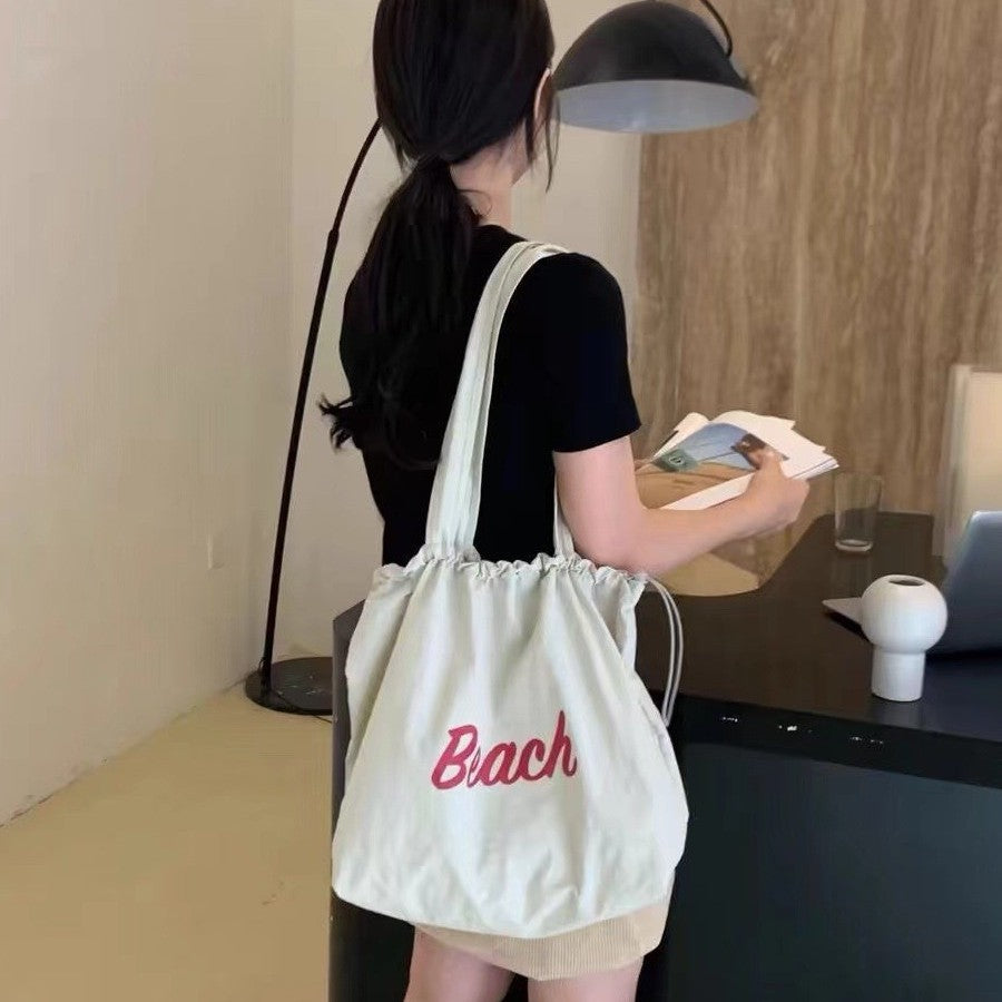 2025 Spring New Fashion Large Capacity Shoulder Tote Bag for Women, Simple Commute Student Style with Beach Print and Drawstring Design
