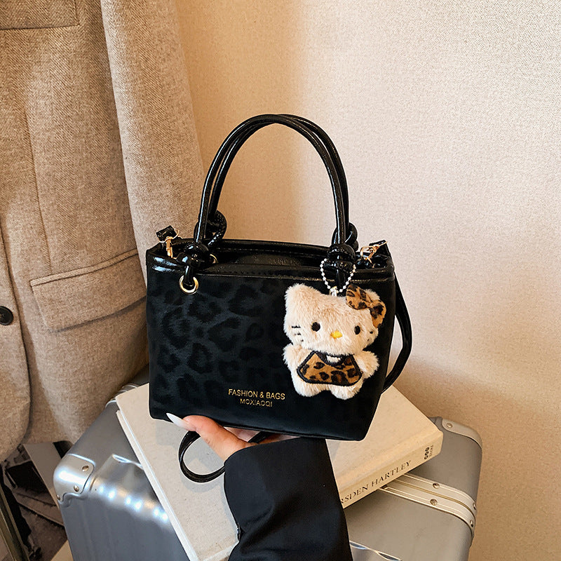 Chic Vintage Bucket Bag with Plush Charm for Women, Perfect for Daily Wear and Fashionable Outfits