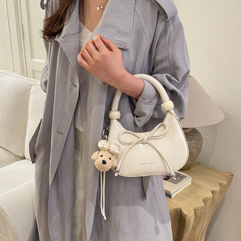2026 New Korean Style Simple Crossbody Bag for Women, Cute Cartoon Pendant, Fashionable Dumpling Shape Handbag with Bow Detail