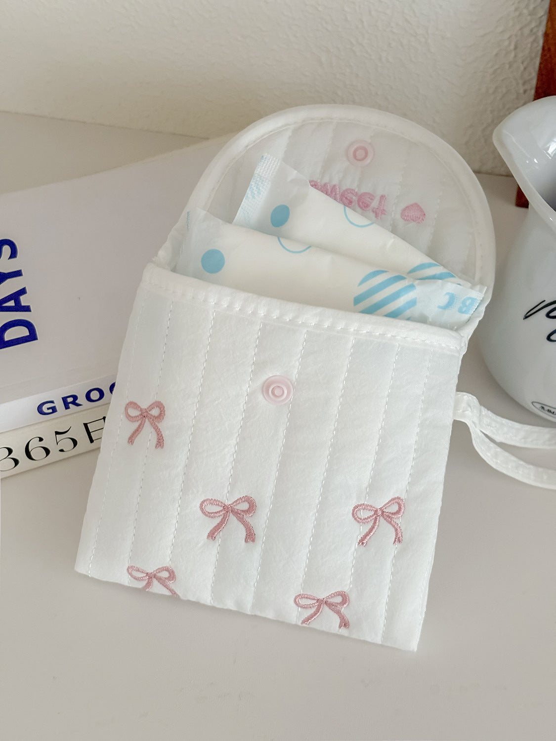 Sweet Embroidered Bow Pouch for Menstrual Products and Daily Essentials, Cute and Portable Design with Stitched Details