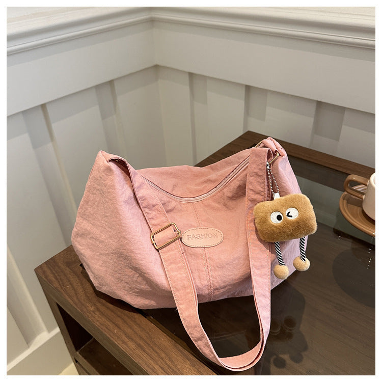 Stylish Crossbody Bag for Women with Cute Pendant, Large Capacity Casual Shoulder Bag for Daily Use and School