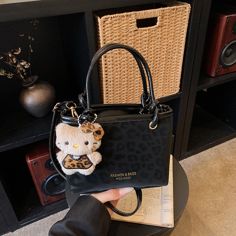 Chic Vintage Bucket Bag with Plush Charm for Women, Perfect for Daily Wear and Fashionable Outfits