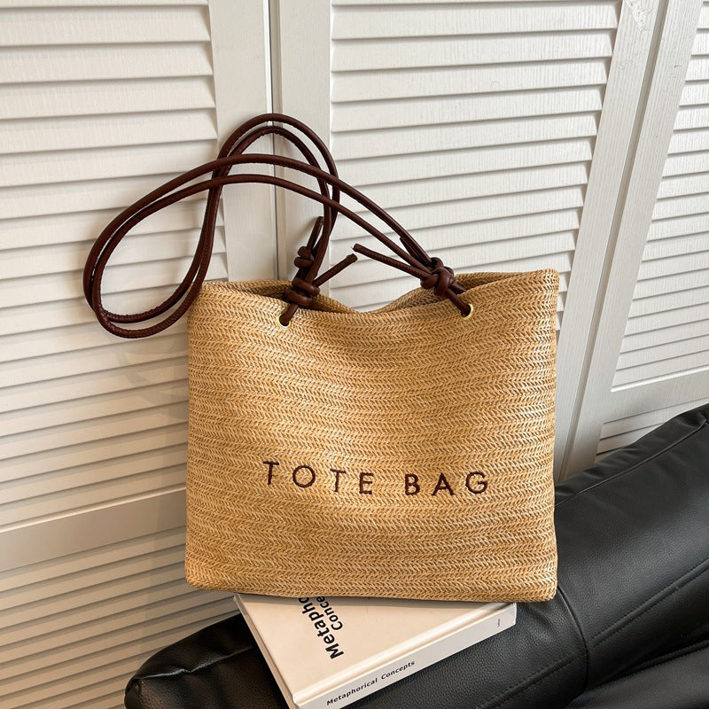Stylish Straw Tote Bag with Leather Handles for Beach, Travel and Daily Use