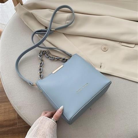 Chic Urban Mini Bucket Bag with Chain Strap and Zip Closure for Everyday Style