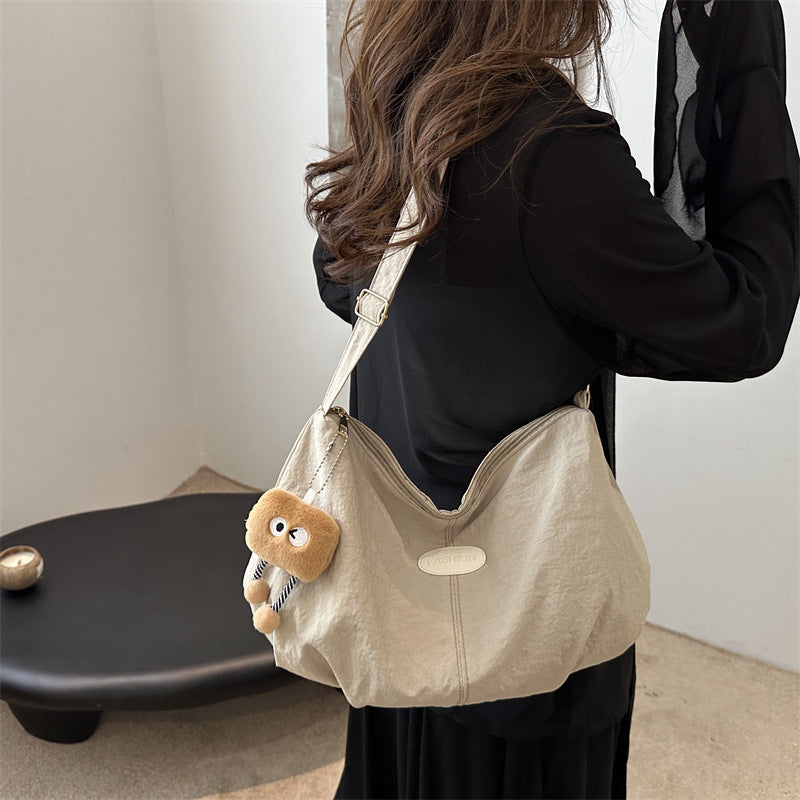 Stylish Crossbody Bag for Women with Cute Pendant, Large Capacity Casual Shoulder Bag for Daily Use and School