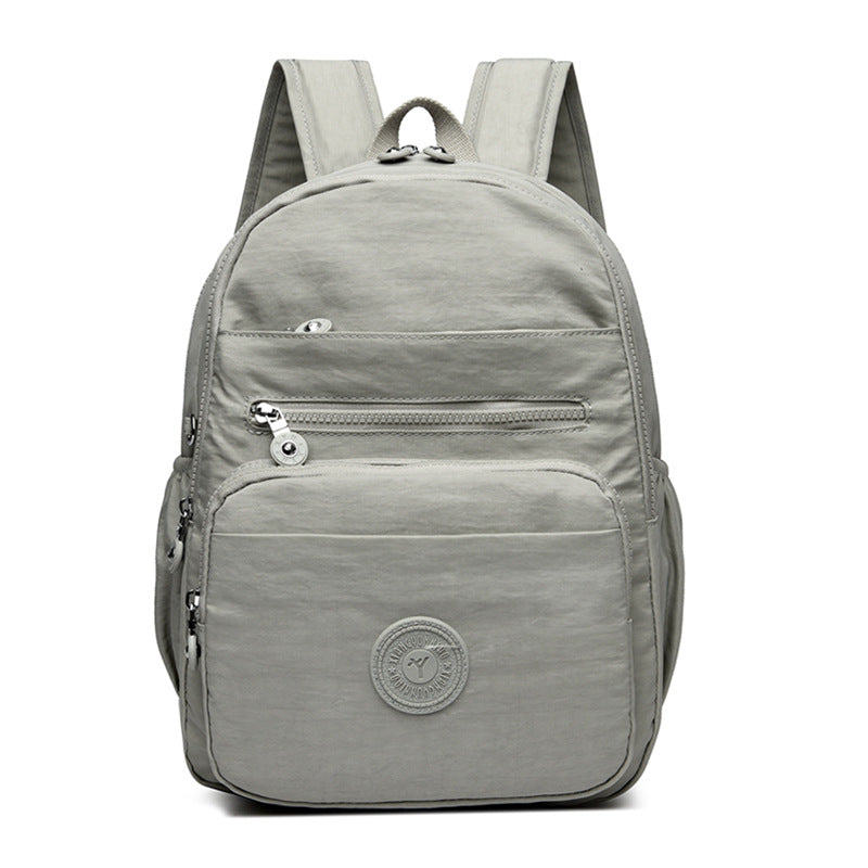 Lightweight Breathable Nylon Backpack for Travel and School, Fashionable Street Style with Multiple Pockets and Zipper Closure